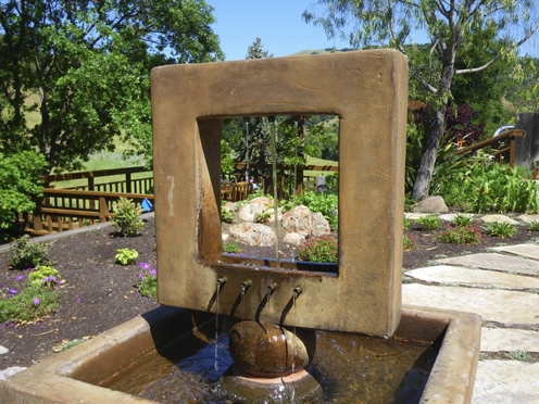 Fountain and flowers in the back yard
