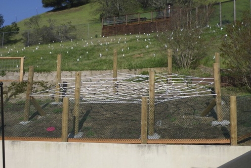 A fence on top of the retaining wall is for safety.