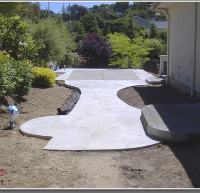 During construction: at the side of the house
