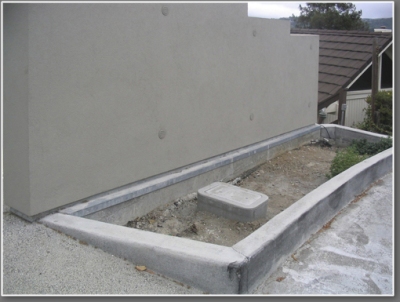 Very small planting bed in front of house