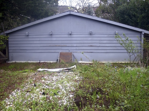 Before looking to back of carport